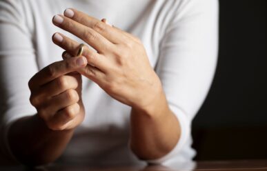 Individual removing wedding ring